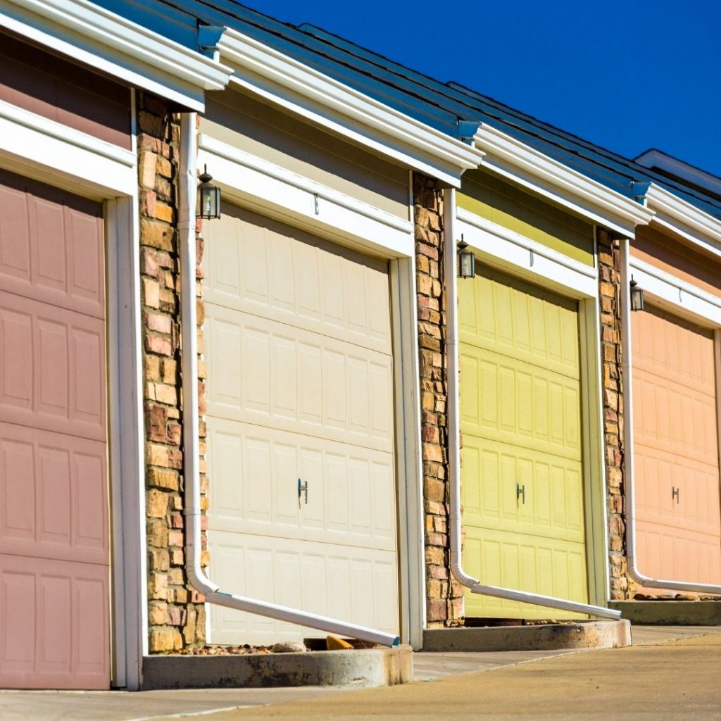 cluster of side by side pastel garage doors